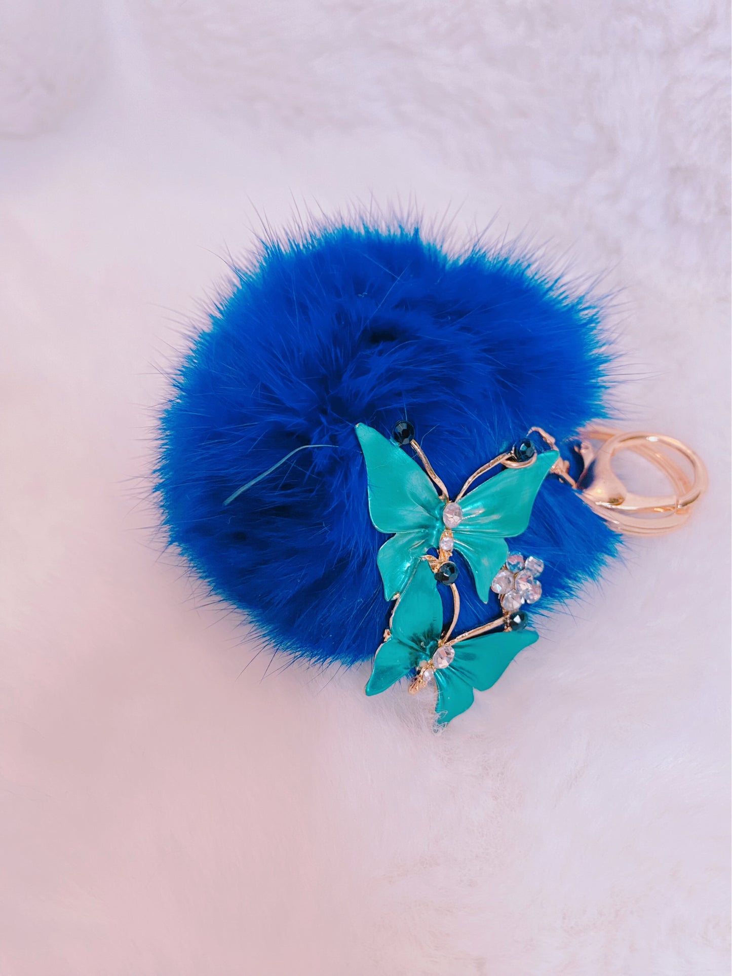 Butterfly blue pom pom bag charm